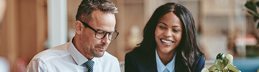 business-people-viewing-laptop-together-digital-value-chain-mobile business people viewing laptop together
