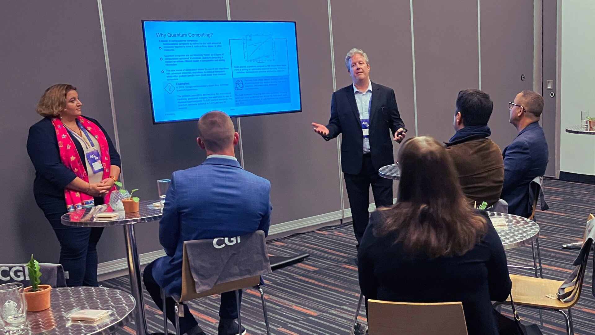 Colleagues talking in a room