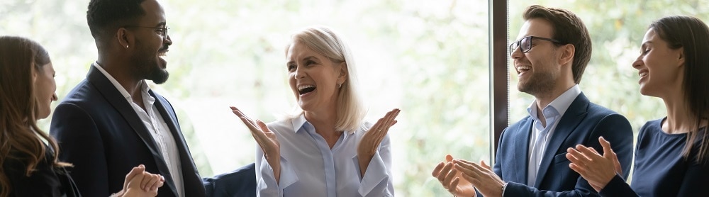 Consultants congratulating each other