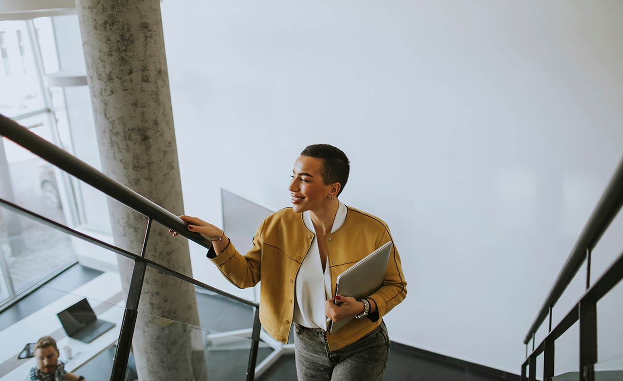 Person walking up stairs Person walking up stairs