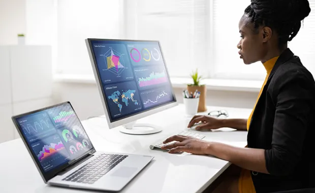 Woman working with data on a computer