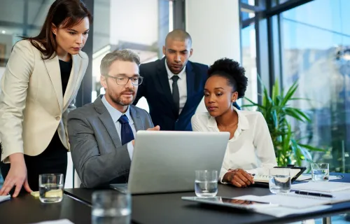 group of people working at desk