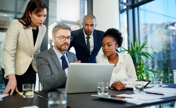 group of people working at desk