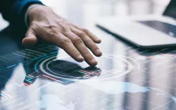 finger pointing at digital board