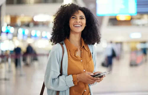 Woman smiling at the airport