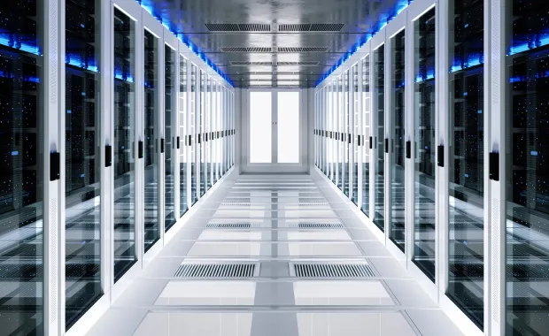 view down the middle of a data server rack center
