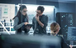 Woman looking at digital tablet