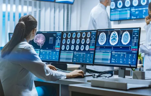 professional viewing medical images on screens