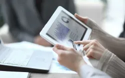 Professionals using tab to analyze data