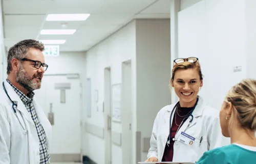 clinicians speaking in hospital