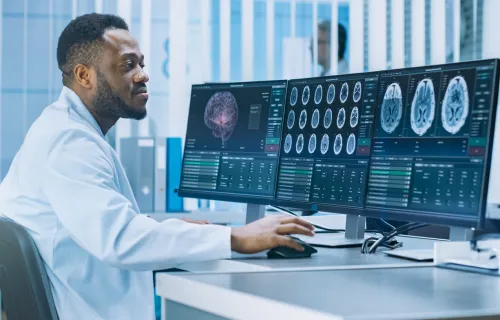 Radiologist reading brain scans