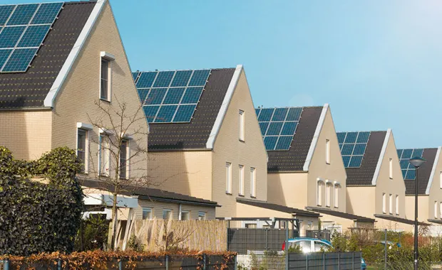 rooftop solar panels on row of houses